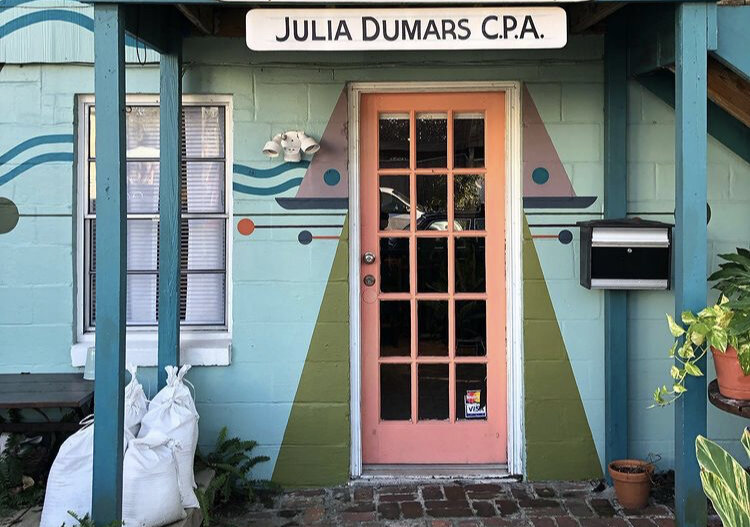 Geometric mural on storefront entrance by Sarah Stewart